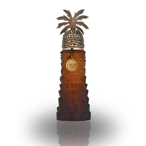 Luxurious Ajwaa EDP bottle by Lattafa Pride with a date-palm inspired design in a rich amber shade, exuding Arabian heritage and elegance.