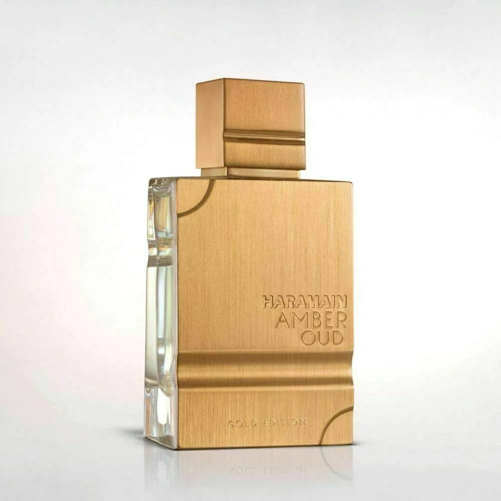 Close-up of Al Haramain Amber Oud Gold Edition bottle, highlighting its sophisticated gold metallic finish.