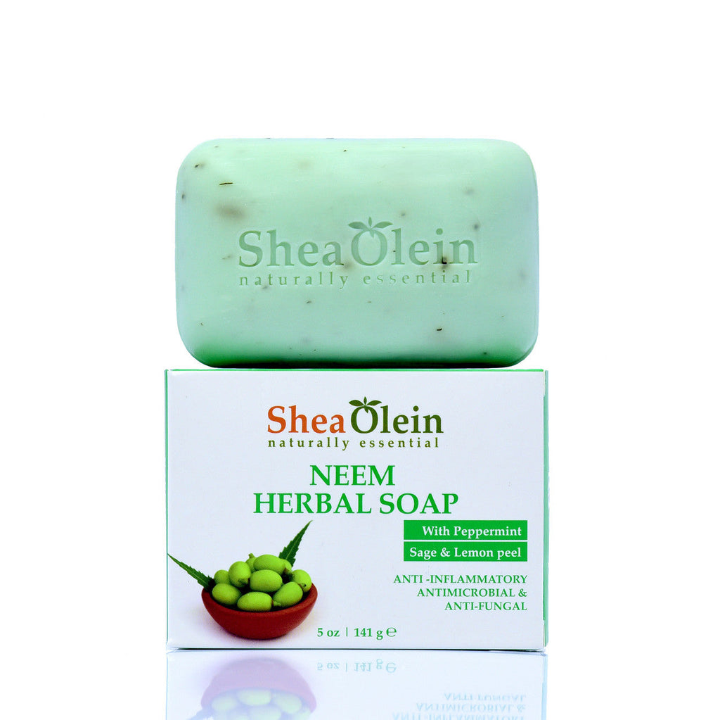 Shea Olein Neem Herbal Soap bar displayed on its box, enriched with Neem Oil, Peppermint, Sage, and Lemon Peel for natural skin care.