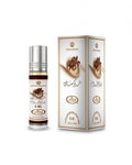 l-Rehab Choco Musk perfume packaging, showcasing a roll-on bottle alongside its box with a floral chocolate design.