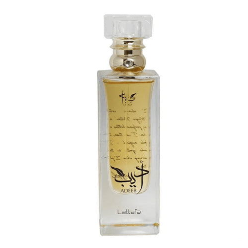 Adeeb EDP 80ML by Lattafa – Stylish transparent glass perfume bottle with gold detailing, featuring a sophisticated and artistic inscription.