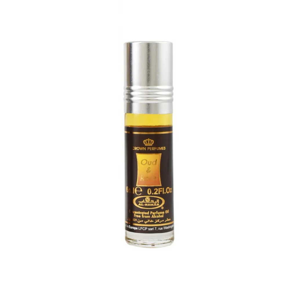 Oud & Rose 6ml roll-on perfume oil by Al-Rehab, showcasing its sleek black and gold design for a luxurious fragrance experience.