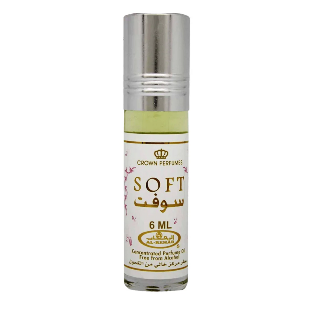 Soft 6ml roll-on concentrated perfume oil by Al-Rehab, showcasing a sleek white and gold design with floral details.
