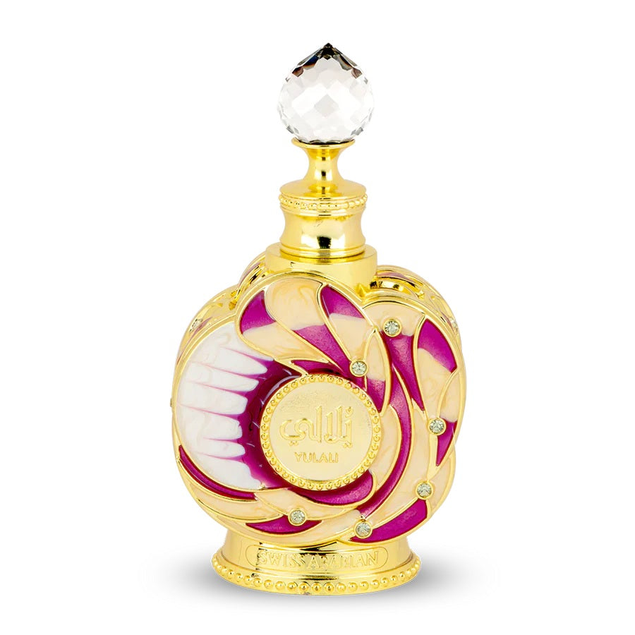 Luxurious Yulali perfume bottle by Swiss Arabian featuring an elegant golden and pink design with a crystal cap.